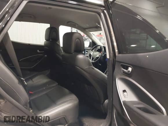 2017 Hyundai Santa Fe 2.0T z VIN 5XYZUDLA9HG433491, wystawiony jako IAAI lot #43298379 z przebiegiem 135 099 mil mil oraz . Historia ofert i sprzedaży dostępna na DreamBid. Obrazek 8.