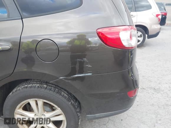 ✅ 2011 Hyundai Santa Fe Limited • VIN: 5XYZKDAG3BG008787 • Lot: 43628091. Listed on IAAI with 199,421 mi. Free auction sales archive from the USA and detailed vehicle history report at DreamBid. Image 12.