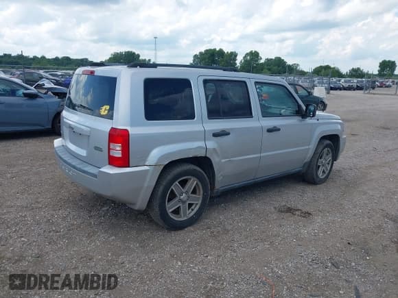 ✅ 2007 Jeep Patriot Sport • VIN: 1J8FF28W17D395749 • Lot: 42615557. Listed on IAAI with 227,783 mi. Free auction sales archive from the USA and detailed vehicle history report at DreamBid. Image 4.