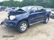 ✅ 2012 Toyota Tacoma PreRunner • VIN: 5TFJU4GN7CX016824 • Lot: 42272110. Listed on IAAI with 165,182 mi. Free auction sales archive from the USA and detailed vehicle history report at DreamBid. Image 2.