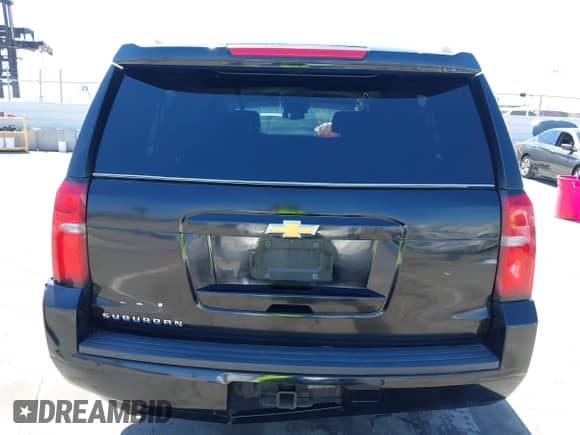 2018 Chevrolet Suburban LS z VIN 1GNSKGKC6JR150248, wystawiony jako IAAI lot #42219120 z przebiegiem 48 321 mil mil oraz . Historia ofert i sprzedaży dostępna na DreamBid. Obrazek 16.