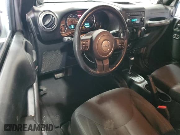 ✅ 2014 Jeep Wrangler Sport • VIN: 1C4AJWAG7EL311978 • Лот: 82536325. Опубликован ранее на Copart с пробегом 165 612 миль. Бесплатный доступ к архиву аукционных продаж из США и подробный отчёт об истории автомобиля на DreamBid. Изображение 8.