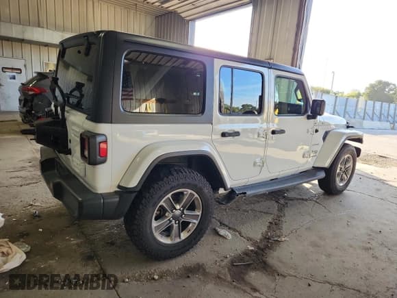 ✅ 2018 Jeep Wrangler Unlimited Sahara • VIN: 1C4HJXEG6JW216240 • Лот: 81991285. Опубликован ранее на Copart с пробегом 87 608 миль. Бесплатный доступ к архиву аукционных продаж из США и подробный отчёт об истории автомобиля на DreamBid. Изображение 3.