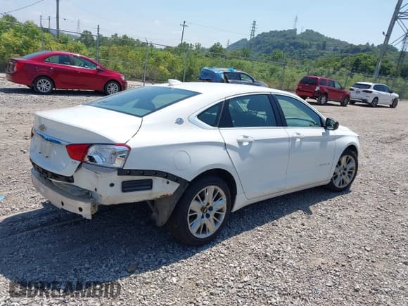 ✅ 2016 Chevrolet Impala LS • VIN: 2G11X5SA9G9128720 • Lot: 42792924. Listed on IAAI with 133,697 mi. Free auction sales archive from the USA and detailed vehicle history report at DreamBid. Image 4.