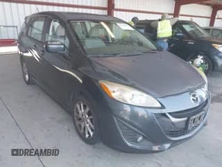 ✅ 2012 Mazda 5 Touring • VIN: JM1CW2CLXC0111947 • Lot: 42690065. Listed on IAAI with 116,308 mi. Free auction sales archive from the USA and detailed vehicle history report at DreamBid. Image 1.