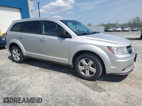 ✅ 2013 Dodge Journey SE • VIN: 3C4PDCAB2DT656231 • Lot: 63900535. Listed on Copart with 182,243 mi. Free auction sales archive from the USA and detailed vehicle history report at DreamBid. Image 4.