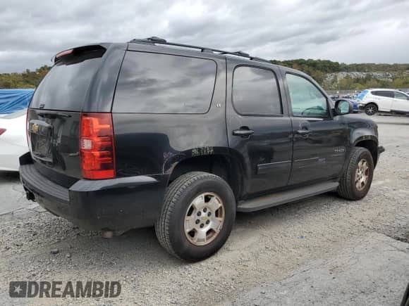 2013 Chevrolet Tahoe LT с VIN 1GNSKBE02DR133519, выставлен на аукционе Copart как лот 86129285 с пробегом 182 828 миль миль и Списание • Salvage title. История ставок и продаж доступна на DreamBid. Изображение 3.