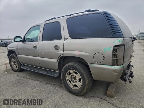 ✅ 2003 Chevrolet Tahoe LS • VIN: 1GNEC13T13R257538 • Lot: 95475405. Listed on Copart with 219,924 mi. Free auction sales archive from the USA and detailed vehicle history report at DreamBid. Image 2.