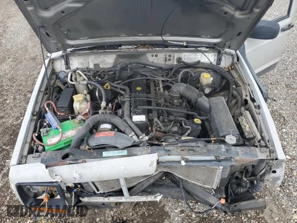 ✅ 2001 Jeep Cherokee • VIN: 1J4FT28S71L507698 • Lot: 57991985. Listed on Copart with Not provided. Free auction sales archive from the USA and detailed vehicle history report at DreamBid. Image 12.