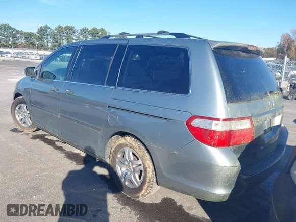 ✅ 2005 Honda Odyssey EX • VIN: 5FNRL38495B099823 • Lot: 43684097. Listed on IAAI with 275,157 mi. Free auction sales archive from the USA and detailed vehicle history report at DreamBid. Image 3.