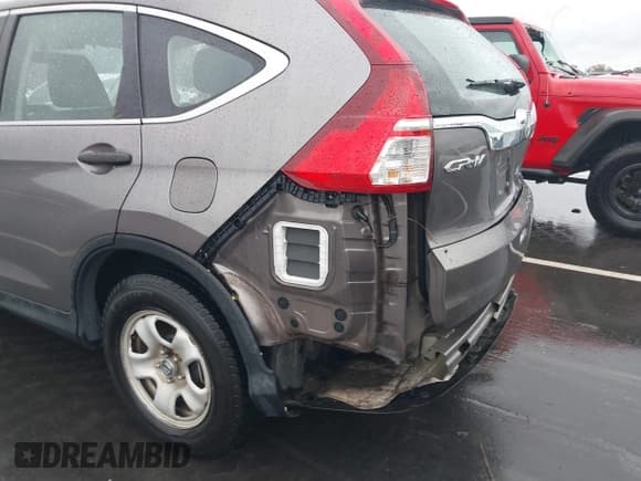 ✅ 2015 Honda CR-V LX • VIN: 2HKRM4H34FH685133 • Lot: 43548022. Listed on IAAI with 144,700 mi. Free auction sales archive from the USA and detailed vehicle history report at DreamBid. Image 18.