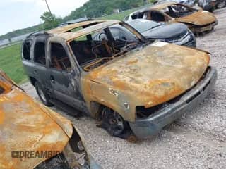 2001 Chevrolet Tahoe LT z VIN 1GNEK13T71R104596, wystawiony jako IAAI lot #42160496 z przebiegiem Nie podano mil oraz . Historia ofert i sprzedaży dostępna na DreamBid. Obrazek 1.