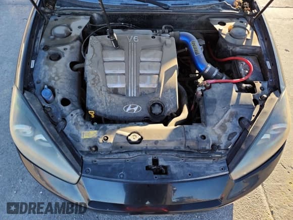 ✅ 2007 Hyundai Tiburon GT • VIN: KMHHN66F37U245828 • Лот: 85207915. Опубликован ранее на Copart с пробегом 126 850 миль. Бесплатный доступ к архиву аукционных продаж из США и подробный отчёт об истории автомобиля на DreamBid. Изображение 11.