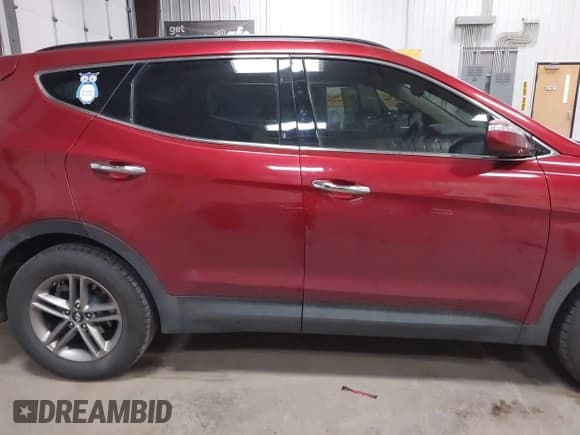✅ 2018 Hyundai Santa Fe 2.4L • VIN: 5XYZU3LB6JG514828 • Лот: 42282610. Опубликован ранее на IAAI с пробегом 204 030 миль. Бесплатный доступ к архиву аукционных продаж из США и подробный отчёт об истории автомобиля на DreamBid. Изображение 14.