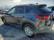 ✅ 2014 Mazda CX-5 Sport • VIN: JM3KE2BE4E0414573 • Лот: 80656255. Опубликован ранее на Copart с пробегом 135 499 миль. Бесплатный доступ к архиву аукционных продаж из США и подробный отчёт об истории автомобиля на DreamBid. Изображение 2.