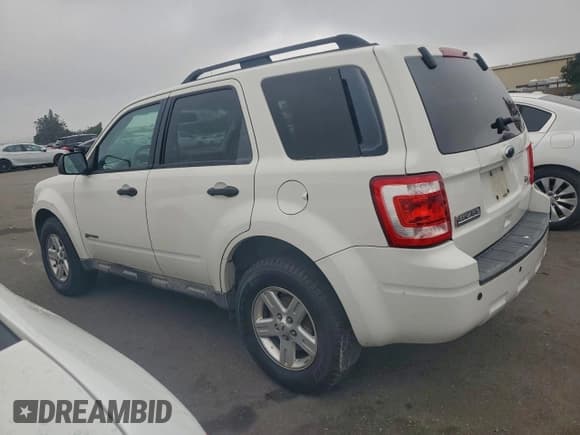 ✅ 2009 Ford Escape Hybrid • VIN: 1FMCU49379KA48873 • Лот: 94673165. Опубликован ранее на Copart с пробегом 326 276 миль. Бесплатный доступ к архиву аукционных продаж из США и подробный отчёт об истории автомобиля на DreamBid. Изображение 2.