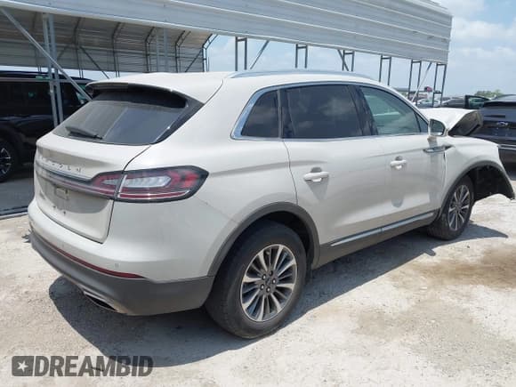 ✅ 2022 Lincoln Nautilus Standard • VIN: 2LMPJ6J95NBL24319 • Лот: 42441795. Опубликован ранее на IAAI с пробегом 29 272 миль. Бесплатный доступ к архиву аукционных продаж из США и подробный отчёт об истории автомобиля на DreamBid. Изображение 4.