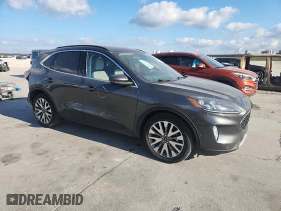 ✅ 2020 Ford Escape Titanium Hybrid • VIN: 1FMCU0DZ0LUC07085 • Лот: 93766395. Опубликован ранее на Copart с пробегом 15 246 миль. Бесплатный доступ к архиву аукционных продаж из США и подробный отчёт об истории автомобиля на DreamBid. Изображение 4.