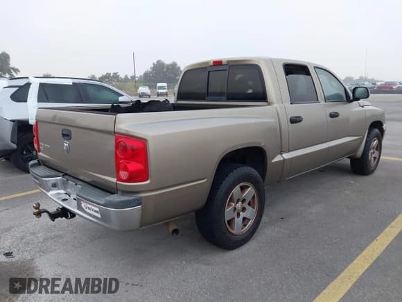 ✅ 2006 Dodge Dakota SLT • VIN: 1D7HE48KX6S528407 • Лот: 43910959. Опубликован ранее на IAAI с пробегом 216 510 миль. Бесплатный доступ к архиву аукционных продаж из США и подробный отчёт об истории автомобиля на DreamBid. Изображение 4.