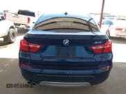 ✅ 2016 BMW X4 xDrive28i • VIN: 5UXXW3C58G0R20117 • Lot: 43209604. Listed on IAAI with 129,659 mi. Free auction sales archive from the USA and detailed vehicle history report at DreamBid. Image 16.