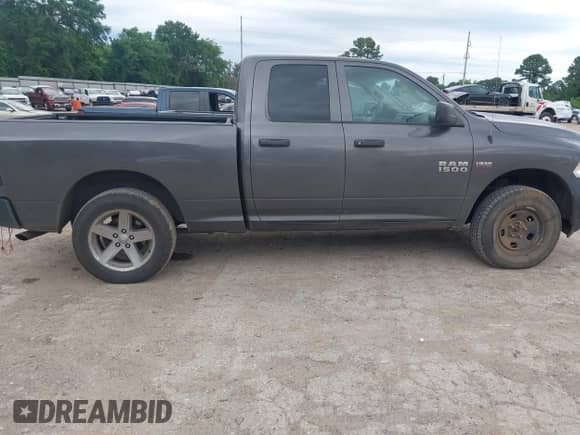 2014 Ram 1500 Express с VIN 1C6RR7FT4ES351004, выставлен на аукционе IAAI как лот 42141410 с пробегом 171 645 миль миль и . История ставок и продаж доступна на DreamBid. Изображение 13.