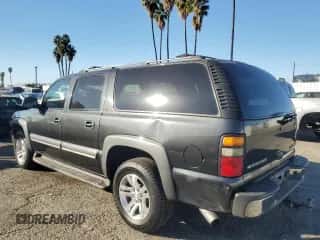 2004 Chevrolet Suburban LT z VIN 3GNEC16T64G182851, wystawiony jako Copart lot #79861864 z przebiegiem 184 798 mil mil oraz Szkoda całkowita • Salvage title. Historia ofert i sprzedaży dostępna na DreamBid. Obrazek 2.