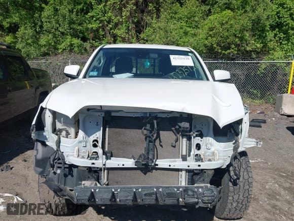 ✅ 2022 Toyota Tacoma SR • VIN: 3TYRX5GN4NT056386 • Lot: 42325120. Listed on IAAI with 57,703 mi. Free auction sales archive from the USA and detailed vehicle history report at DreamBid. Image 13.