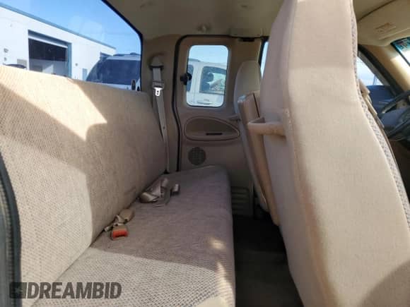 2000 Dodge 1500 z VIN 3B7HC13Z8YM241128, wystawiony jako Copart lot #76496774 z przebiegiem 125 929 mil mil oraz Szkoda całkowita • Salvage title. Historia ofert i sprzedaży dostępna na DreamBid. Obrazek 10.