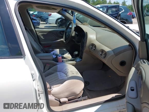 ✅ 2004 Pontiac Bonneville SE • VIN: 1G2HX52K14U176018 • Lot: 42691668. Wystawiony na IAAI z przebiegiem 185 274 mil. Bezpłatny archiwum sprzedaży aukcyjnych z USA i szczegółowy raport historii pojazdu na DreamBid. Zdjęcie 5.