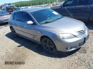 ✅ 2005 Mazda 3 s • VIN: JM1BK143751281180 • Lot: 42386932. Listed on IAAI with 271,861 mi. Free auction sales archive from the USA and detailed vehicle history report at DreamBid. Image 1.