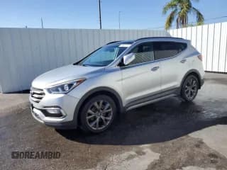 ✅ 2017 Hyundai Santa Fe Ultimate • VIN: 5XYZWDLA4HG412610 • Lot: 92193065. Listed on Copart with 114,935 mi. Free auction sales archive from the USA and detailed vehicle history report at DreamBid. Image 1.