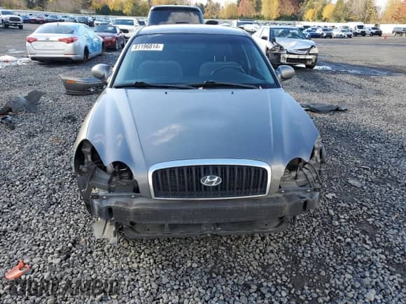 2003 Hyundai Sonata GLS с VIN KMHWF35H63A735505, выставлен на аукционе Copart как лот 81196814 с пробегом 82 051 миль миль и Списание • Salvage title. История ставок и продаж доступна на DreamBid. Изображение 5.