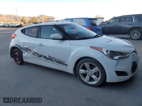 ✅ 2014 Hyundai Veloster • VIN: KMHTC6AD8EU213346 • Lot: 82717534. Wystawiony na Copart z przebiegiem 93 472 mil. Bezpłatny archiwum sprzedaży aukcyjnych z USA i szczegółowy raport historii pojazdu na DreamBid. Zdjęcie 4.