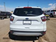 ✅ 2018 Ford Escape SE • VIN: 1FMCU9GD1JUB01911 • Lot: 80621525. Wystawiony na Copart z przebiegiem 91 262 mil. Bezpłatny archiwum sprzedaży aukcyjnych z USA i szczegółowy raport historii pojazdu na DreamBid. Zdjęcie 6.
