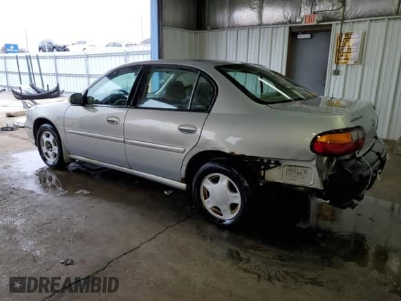 2000 Chevrolet Malibu LS z VIN 1G1NE52J4Y6106544, wystawiony jako Copart lot #42639405 z przebiegiem 167 734 mil mil oraz Szkoda całkowita • Salvage title. Historia ofert i sprzedaży dostępna na DreamBid. Obrazek 2.