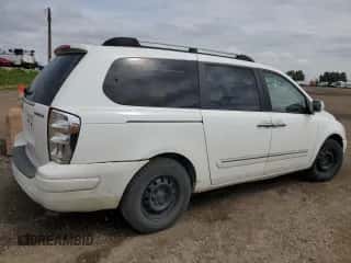 2007 Hyundai Entourage GLS z VIN KNDMC233676011795, wystawiony jako Copart lot #66430825 z przebiegiem 305 490 mil mil oraz Szkoda całkowita • Salvage title. Historia ofert i sprzedaży dostępna na DreamBid. Obrazek 3.