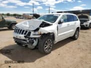 ✅ 2015 Jeep Grand Cherokee Overland • VIN: 1C4RJFCT7FC717371 • Lot: 80313135. Listed on Copart with 129,977 mi. Free auction sales archive from the USA and detailed vehicle history report at DreamBid. Image 1.