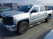 2018 Chevrolet Silverado 1500 LT with VIN 3GCPCREC8JG580088, listed as a IAAI auction lot 43278290 with 72,832 mi miles and . Bid and sale history available at DreamBid. Image 2.