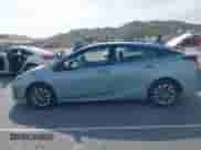 2021 Toyota Prius L Eco with VIN JTDKAMFU6M3127489, listed as a IAAI auction lot 42046658 with 126,249 mi miles and . Bid and sale history available at DreamBid. Image 14.