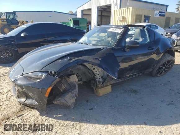 ✅ 2024 Mazda MX-5 Miata Grand Touring • VIN: JM1NDAM77R0600695 • Lot: 92503155. Listed on Copart with 29,800 mi. Free auction sales archive from the USA and detailed vehicle history report at DreamBid. Image 1.