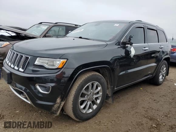 ✅ 2015 Jeep Grand Cherokee Overland • VIN: 1C4RJFCM7FC880093 • Lot: 82241784. Listed on Copart with 158,346 mi. Free auction sales archive from the USA and detailed vehicle history report at DreamBid. Image 1.