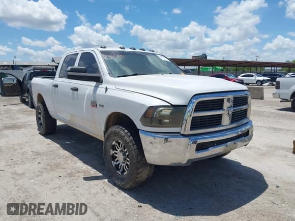 ✅ 2012 Ram 2500 ST • VIN: 3C6TD5CT8CG198855 • Lot: 42546504. Listed on IAAI with 290,000 mi. Free auction sales archive from the USA and detailed vehicle history report at DreamBid. Image 1.