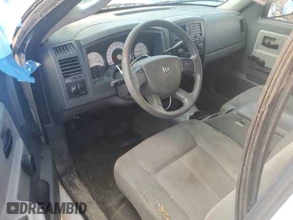 2005 Dodge Dakota ST с VIN 1D7HW28K45S327165, выставлен на аукционе Copart как лот 51739225 с пробегом 166 932 миль миль и Списание • Salvage title. История ставок и продаж доступна на DreamBid. Изображение 8.