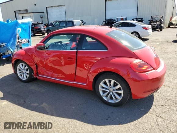 ✅ 2014 Volkswagen Beetle 2.0L TDI • VIN: 3VWJL7AT4EM660038 • Lot: 69712414. Listed on Copart with 48,595 mi. Free auction sales archive from the USA and detailed vehicle history report at DreamBid. Image 2.