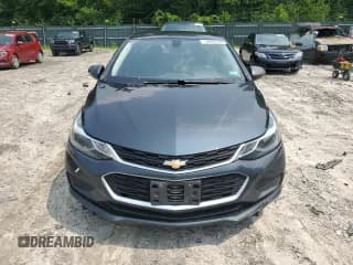 ✅ 2018 Chevrolet Cruze LT • VIN: 1G1BE5SM5J7156558 • Lot: 59957533. Listed on Copart with 114,349 mi. Free auction sales archive from the USA and detailed vehicle history report at DreamBid. Image 5.