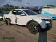 2022 Hyundai Santa Cruz SEL with VIN 5NTJBDAE3NH031402, listed as a Copart auction lot 47799165 with 48,156 mi miles and Salvage title. Bid and sale history available at DreamBid. Image 4.