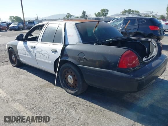 ✅ 2008 Ford Police Interceptor • VIN: 2FAFP71V18X150470 • Lot: 42301553. Listed on IAAI with 82,116 mi. Free auction sales archive from the USA and detailed vehicle history report at DreamBid. Image 3.