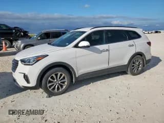 ✅ 2019 Hyundai Santa Fe SE • VIN: KM8SN4HF7KU298774 • Лот: 87270875. Опубликован ранее на Copart с пробегом 112 448 миль. Бесплатный доступ к архиву аукционных продаж из США и подробный отчёт об истории автомобиля на DreamBid. Изображение 1.