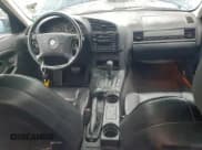 ✅ 1997 BMW 3 Series 318i • VIN: WBACC0327VEK25041 • Lot: 94437345. Listed on Copart with 15,895 mi. Free auction sales archive from the USA and detailed vehicle history report at DreamBid. Image 8.