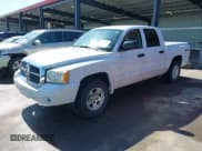 ✅ 2005 Dodge Dakota SLT • VIN: 1D7HW48N75S263077 • Lot: 42537856. Listed on IAAI with 182,479 mi. Free auction sales archive from the USA and detailed vehicle history report at DreamBid. Image 2.